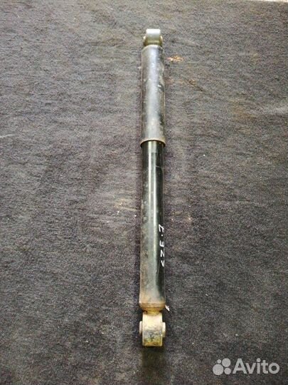 Стойка амортизатора задняя Suzuki Grand Vitara