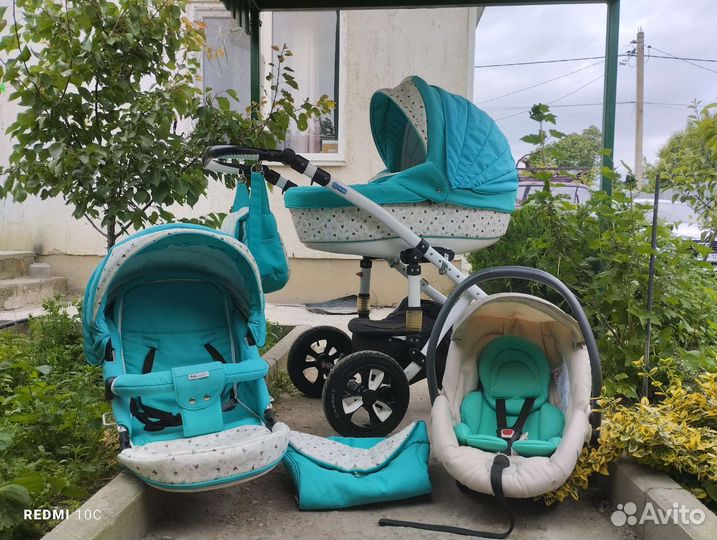 Коляска 3в1 на четырёх амортизаторах