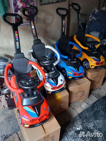 Машинка каталка с ручкой управления