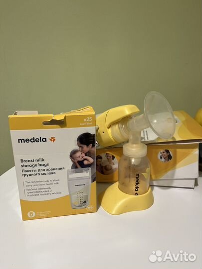 Молокоотсос medela mini электрический
