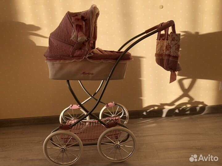 Игрушечная коляска для кукол