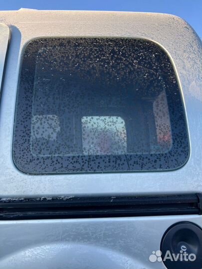 Стекло заднее глухое в кузов заднее левое Renault