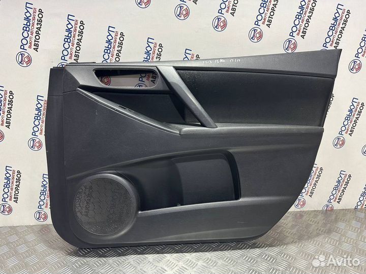 Обшивка двери Mazda 3 BL
