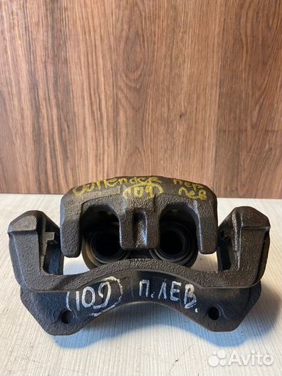 Суппорт передний левый Mitsubishi Outlander CU