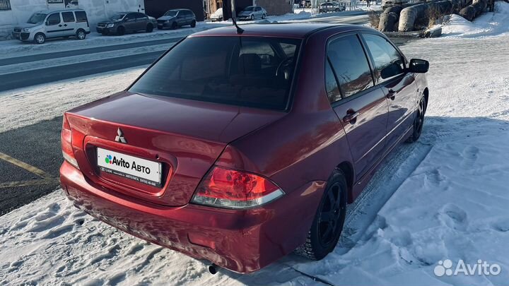 Mitsubishi Lancer 1.6 AT, 2004, 289 700 км