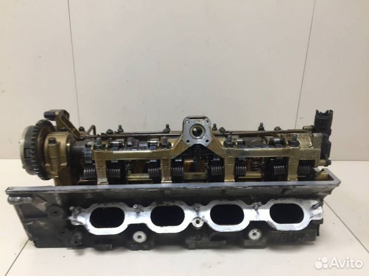 Б/У Головка блока цилиндров 11121556428 BMW
