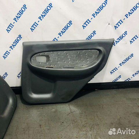 Обшивка двери зад лев Kia Spectra