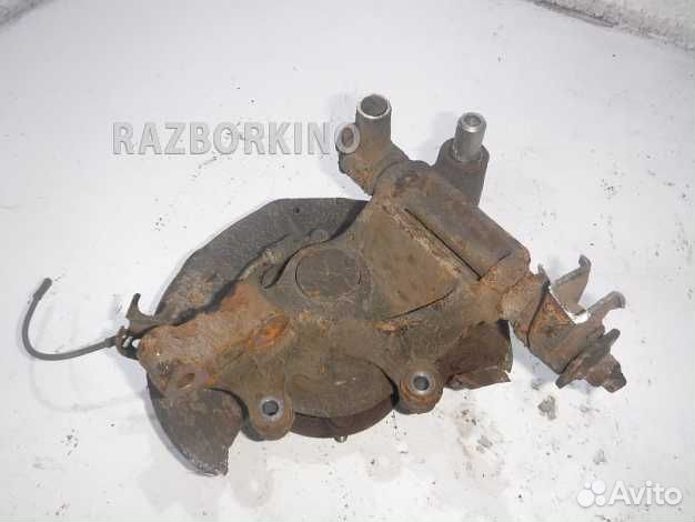 Кулак задний левый Мазда