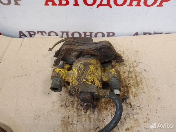 Суппорт тормозной задний правый Dodge Caravan 3.3