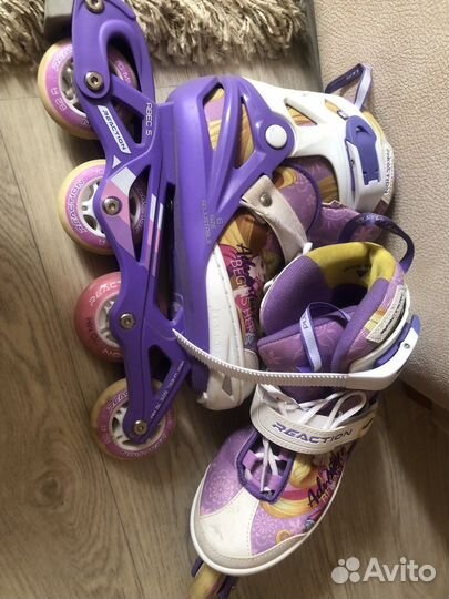 Роликовые коньки