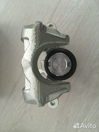 Суппорт тормозной задний левый opel astra J