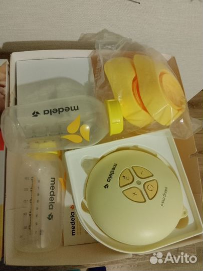 Молокоотсос Medela swing maxi электрический