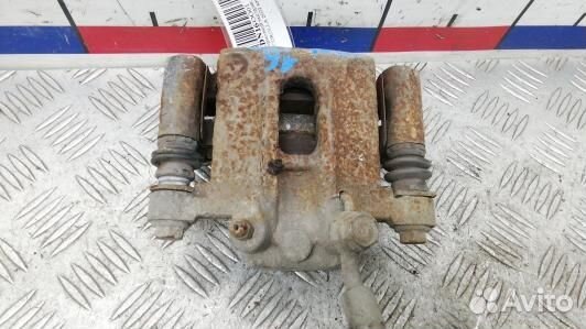 Суппорт тормозной задний правый toyota corolla E12