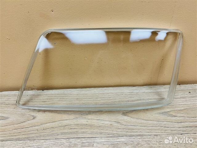 Стекло фары переднее левое Man