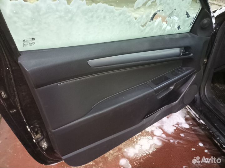 Обшивка двери передняя левая Opel Astra H GTC