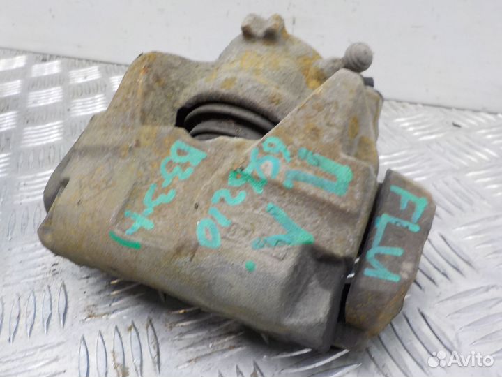 Суппорт тормозной передний левый Renault Fluence 2