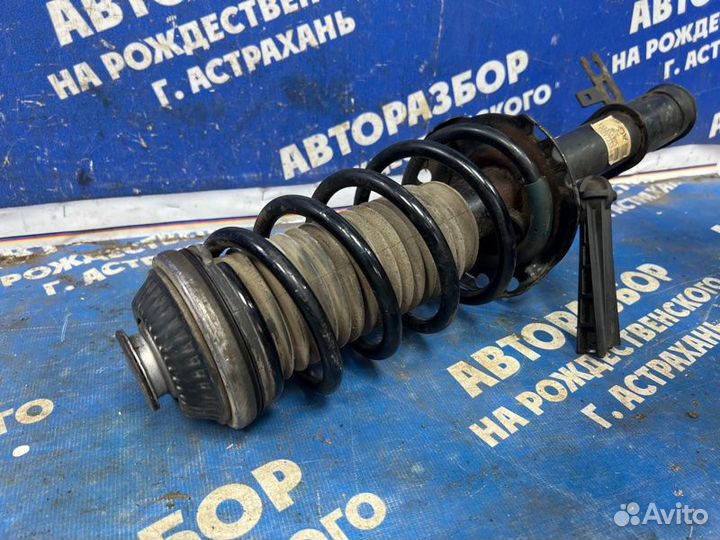 Передняя левая стойка амортизатора Opel Astra Gtc