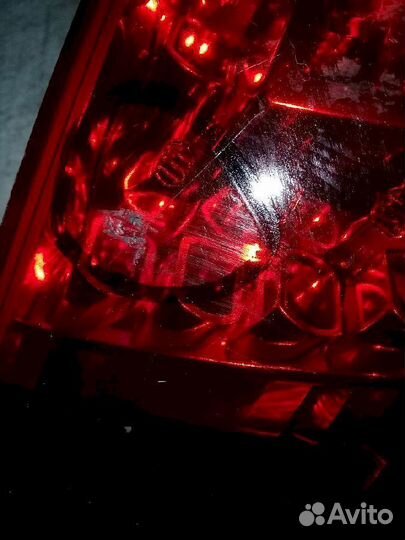 Фонарь (стоп сигнал) задний левый 4F9.945.095B лев