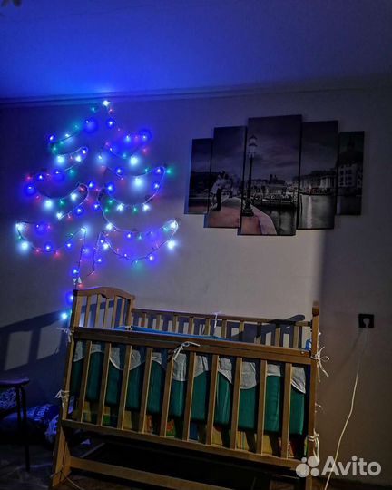 Детская кроватка с маятником