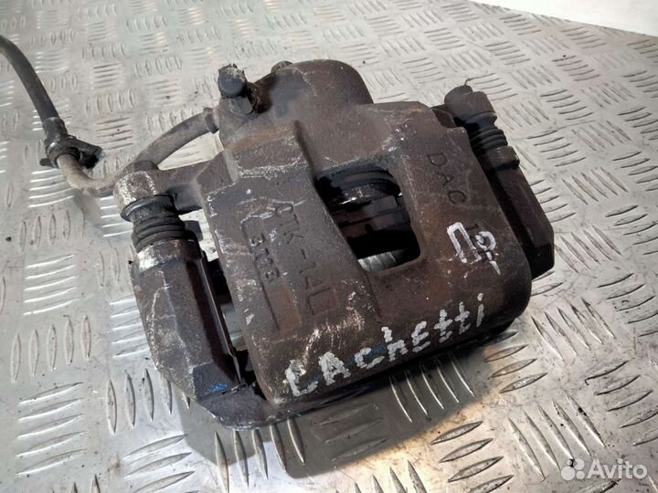 Суппорт передний Шевроле Лачетти