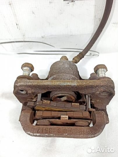 Суппорт тормозной задний левый Murano (Z50) 2004-2