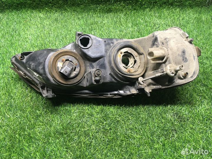 Фара левая Opel Astra G