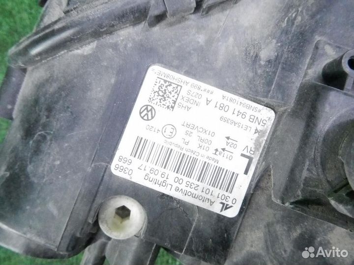 Фара левая Volkswagen Tiguan