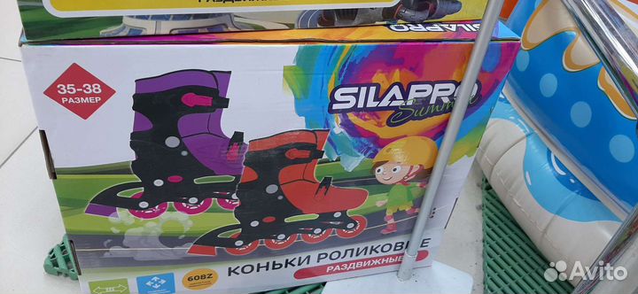 Коньки роликовые,красные