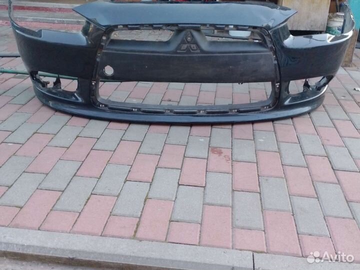 Вампер Мицубиси Лансер