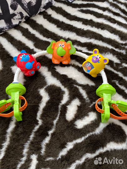 Развивающая игрушка (дуга) на коляску