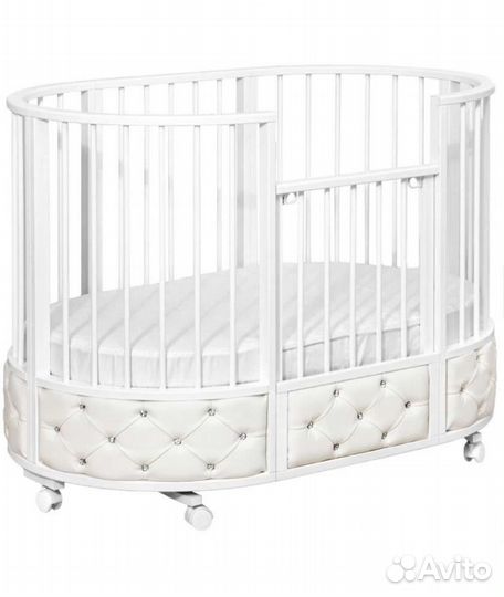 Детская кроватка с маятником