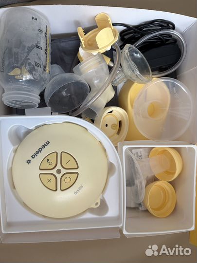 Молокоотсос medela swing электрический