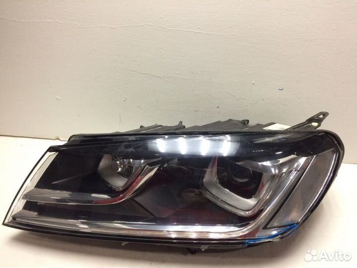 Фара левая Volkswagen Touareg