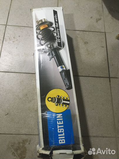 Стойка амортизатора передняя левая Ford connect