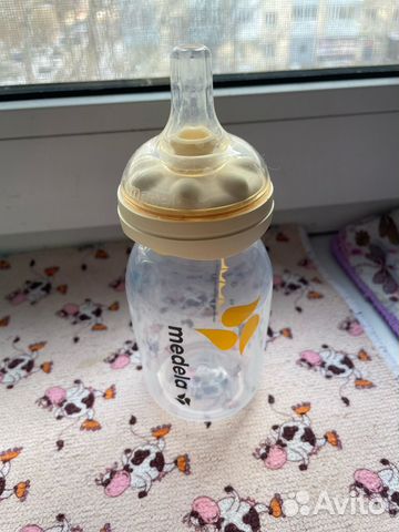 Бутылочка для кормления madela + пакеты для молока