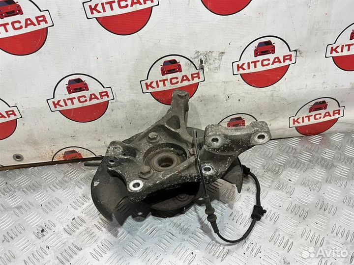 Кулак поворотный левый Opel Astra J