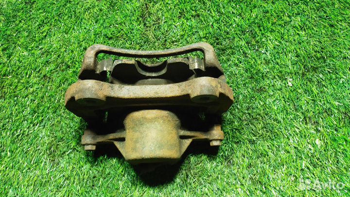 Суппорт тормозной передний правый Opel Astra J