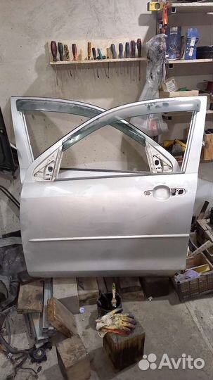Двери перед mazda demio 2