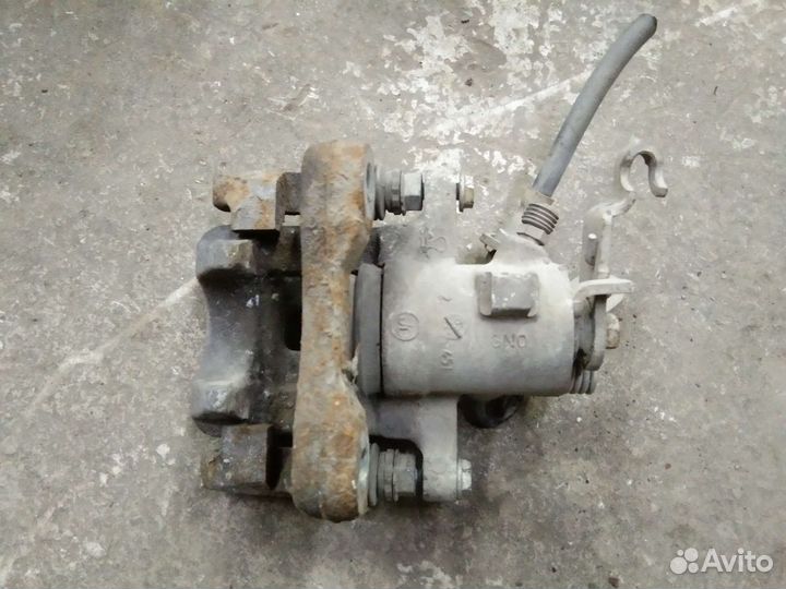 Суппорт задний Шкода Октавия A5