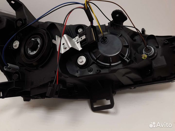 Фара левая Mitsubishi lancer 10