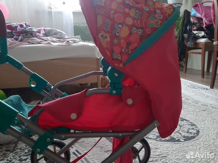 Игрушечная коляска для кукол