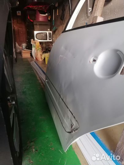 Дверь задняя правая калина уневирсал