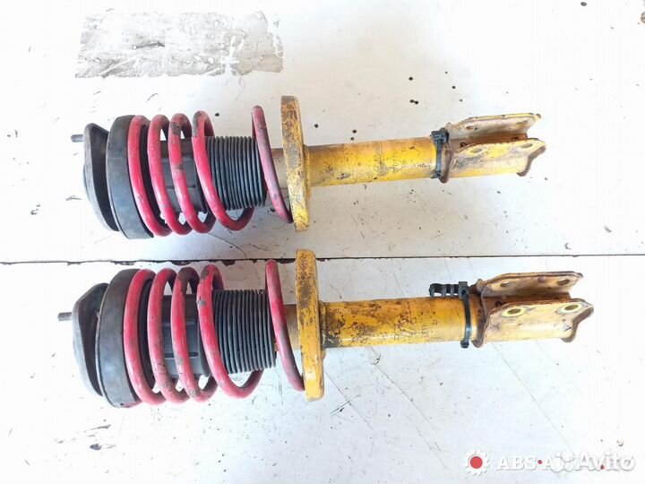 Стойка амортизатора передняя Opel Tigra 1997