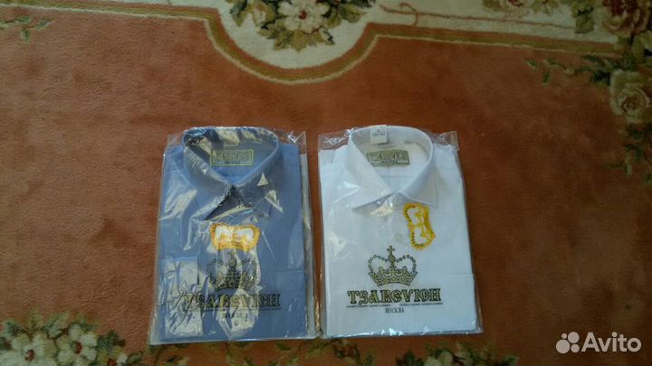 Рубашки новые