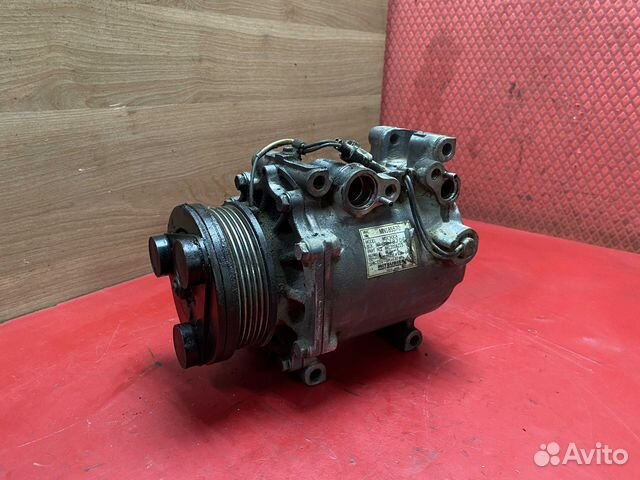 Компрессор кондиционера MN185570 Mitsubishi Lancer
