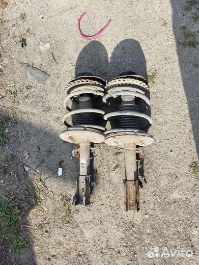 Стойки передние Dodge Caravan