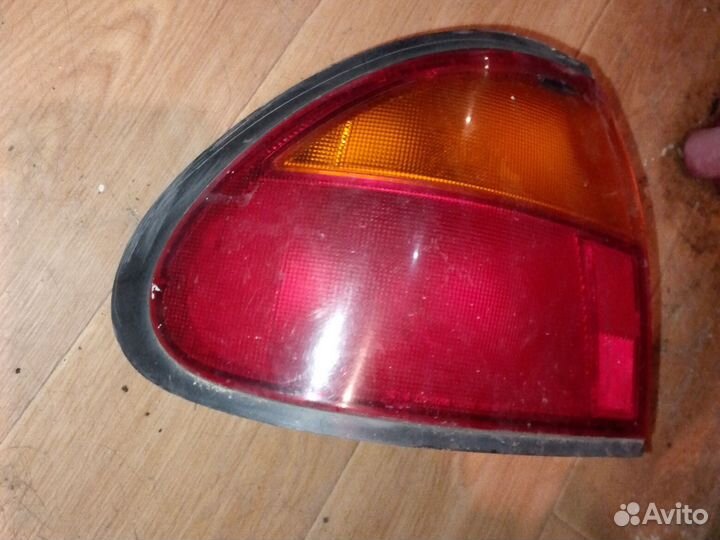 Фонарь задний левый Мазда 323 ba
