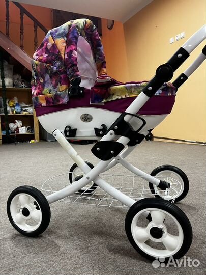 Детская игрушечная коляска