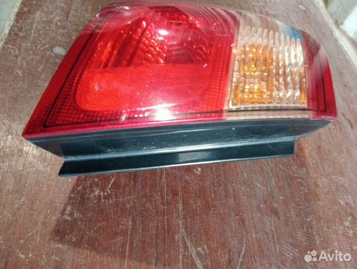 Стоп-сигнал левый Nissan Bluebird Sylphy TG10