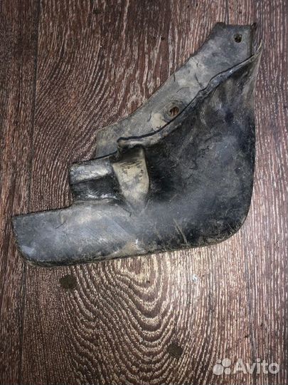 Брызговик передний левый Toyota Camry CV30 2CT